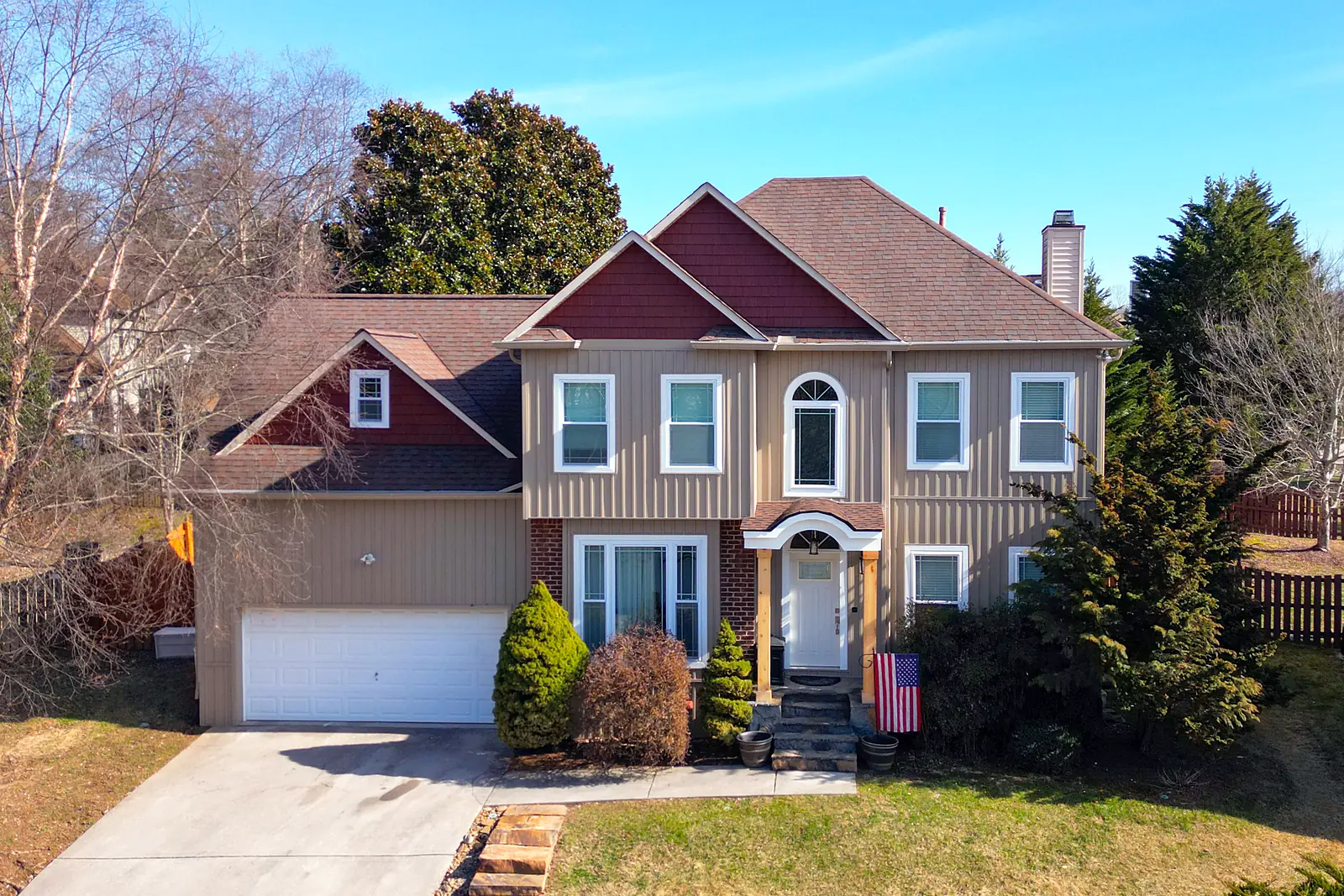 New vertical siding on a two-story East Tennessee home
