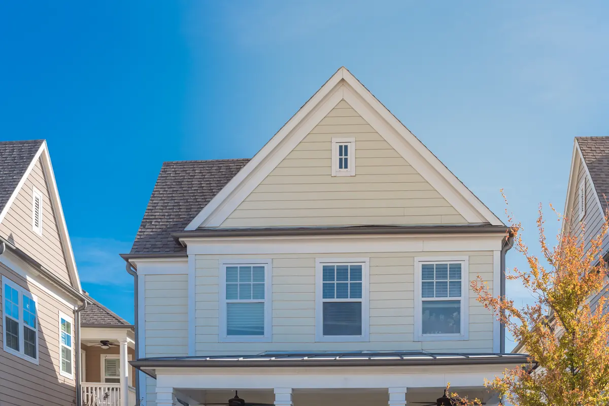 Two-story home with siding on the front gable, a common spot for Tando shake accents